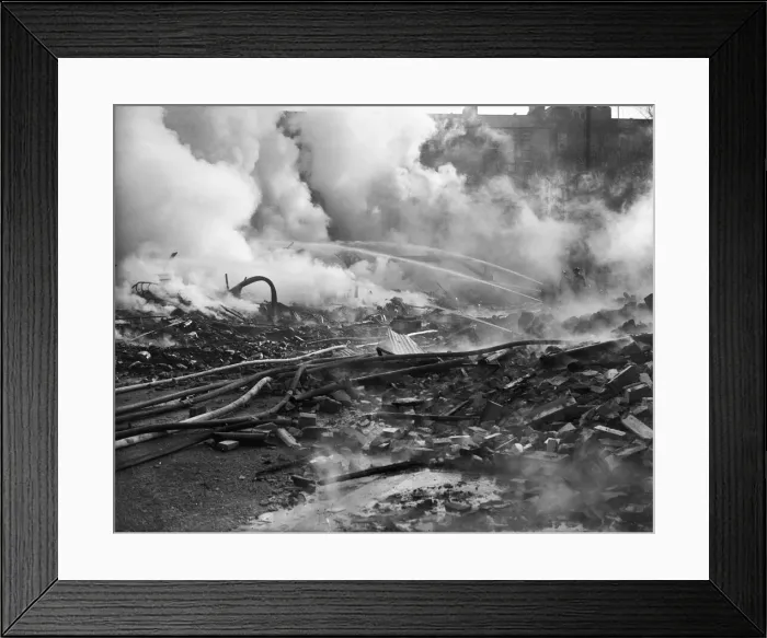 Framed Print : Firemen dampen down the fires caused by a a Luftwaffe attack on the City of Bristol Framed Print : Firemen dampen down the fires caused by a a Luftwaffe attack on the City of Bristol