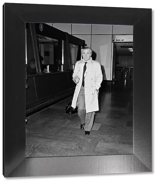 Bryan Forbes leaving Heathrow Airport for Paris. 4th March 1980