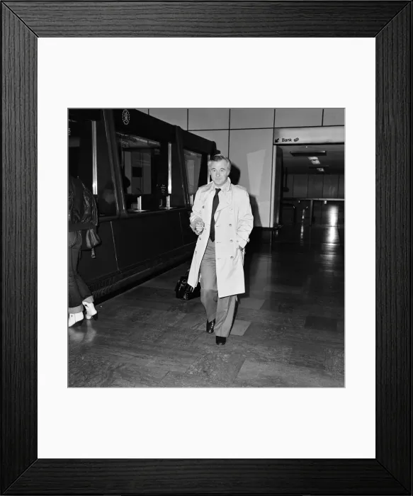Framed Print : Bryan Forbes leaving Heathrow Airport for Paris. 4th March 1980 Framed Print : Bryan Forbes leaving Heathrow Airport for Paris. 4th March 1980