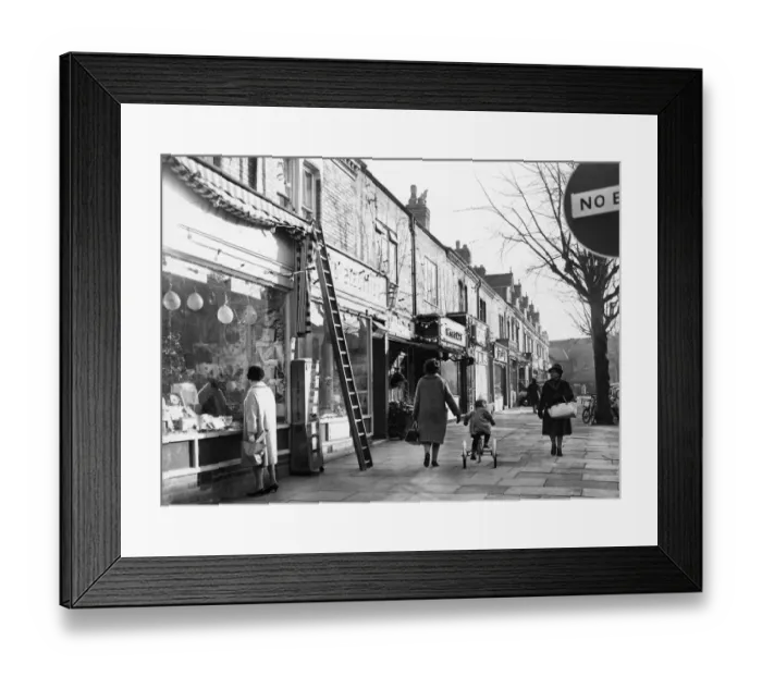 Framed Print : Christmas lights go up at the parade of shops on Allandale Road, Leicester