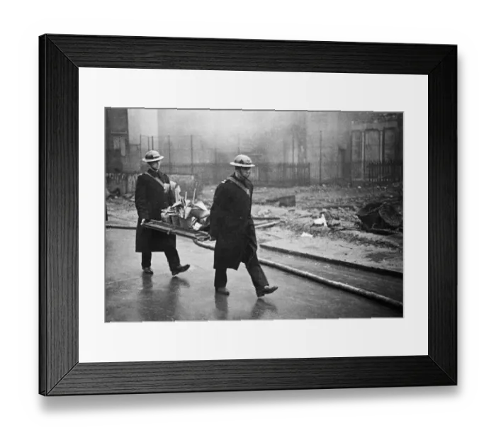 Framed Print : Fire crews, police and Air Raid Precaution (ARP) wardens help salvage furniture