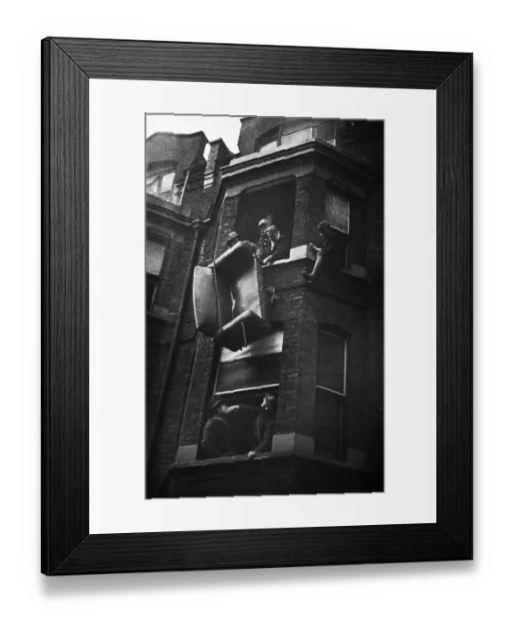 Framed Print : Fire crews, police and ARP wardens help salvage furniture from properties close to