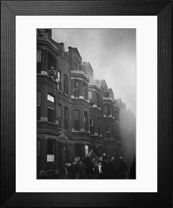 Framed Print : Fire crews, police and ARP wardens help salvage furniture from properties close to