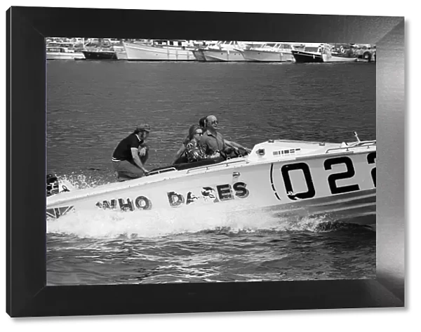 Princess Anne driving a speed boat called Who Dares around Monte Carlo Bay alongside