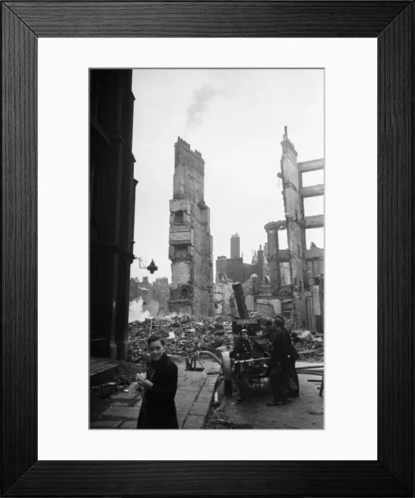 Framed Print : Firemen dampening down the smouldering ruins in the the City of London following Framed Print : Firemen dampening down the smouldering ruins in the the City of London following