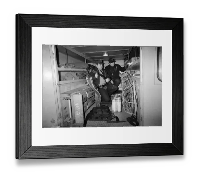 Framed Print : Two New York Policemen in the back of their truck with their equipment Framed Print : Two New York Policemen in the back of their truck with their equipment