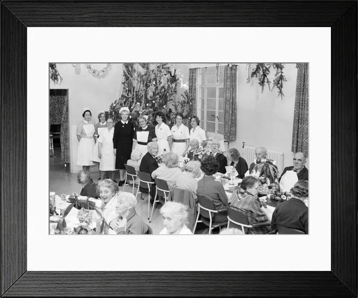 Framed Print : Christmas Lunch for residents and staff at hospital, Hydestile, Surrey Framed Print : Christmas Lunch for residents and staff at hospital, Hydestile, Surrey