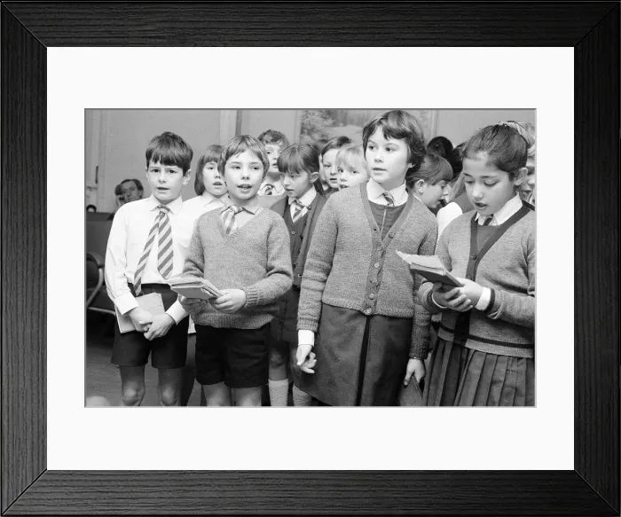 Framed Print : St Josephs Primary School, children singing to elderly at the Old Peoples Centre in Framed Print : St Josephs Primary School, children singing to elderly at the Old Peoples Centre in