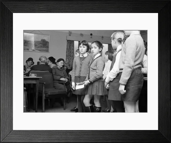 Framed Print : St Josephs Primary School, children singing to elderly at the Old Peoples Centre in Framed Print : St Josephs Primary School, children singing to elderly at the Old Peoples Centre in