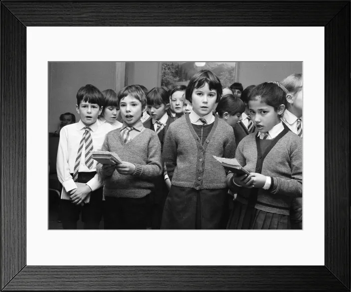 Framed Print : St Josephs Primary School, children singing to elderly at the Old Peoples Centre in Framed Print : St Josephs Primary School, children singing to elderly at the Old Peoples Centre in