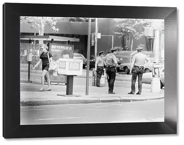Police Officers standing on street corner, New York, USA, June 1984, also pictured