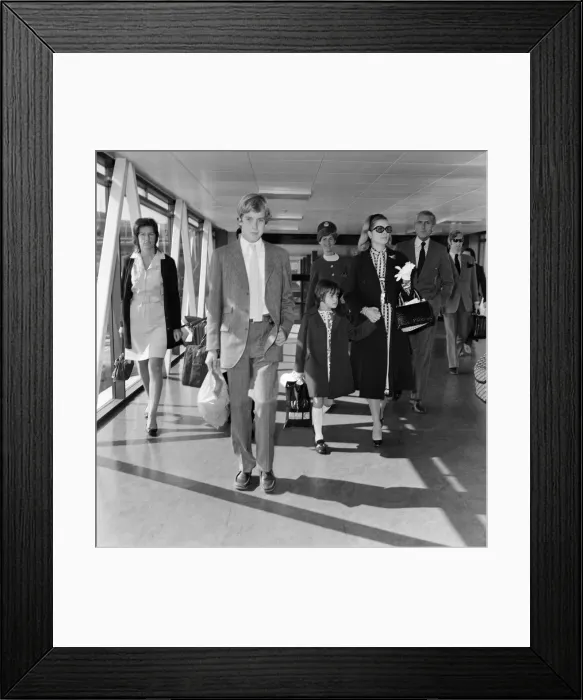 Framed Print : Princess Grace of Monaco leaves Heathrow Airport with Crown Prince Albert Framed Print : Princess Grace of Monaco leaves Heathrow Airport with Crown Prince Albert