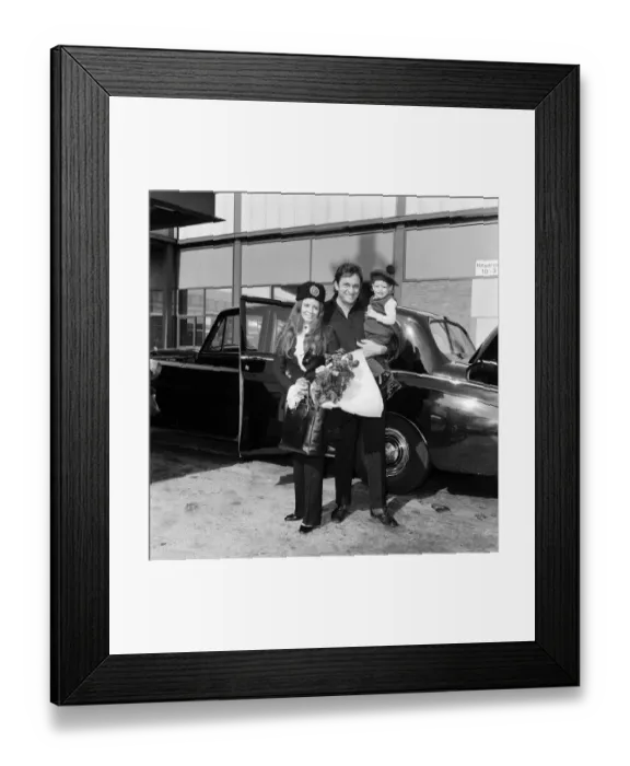 Framed Print : Singer Johnny Cash arrives at Heathrow Airport from Manchester with his wife June Carter Framed Print : Singer Johnny Cash arrives at Heathrow Airport from Manchester with his wife June Carter