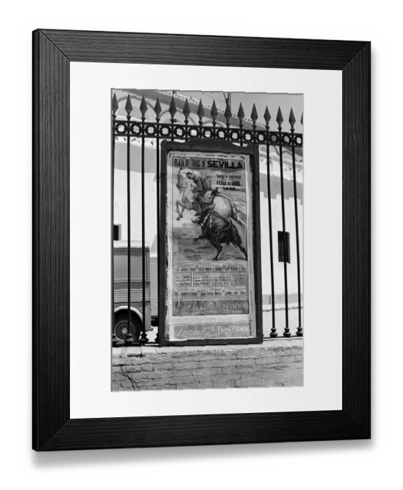 Framed Print : A poster advertising the Seville Fair. Seville, Spain. April 1966 Framed Print : A poster advertising the Seville Fair. Seville, Spain. April 1966
