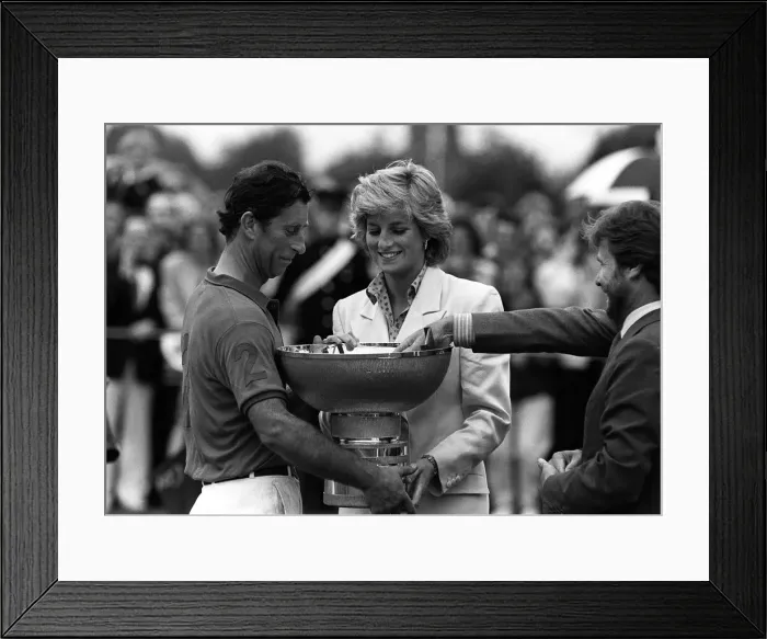 Framed Print : PRINCE CHARLES AND PRINCESS DIANA. CHARLES BEING PRESENTED WITH A TROPHY FOR WINNING SOME