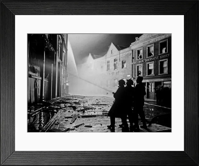 Framed Print : Members of the Auxiliary Fire Service and London Fire Brigade seen here fighting a fire Framed Print : Members of the Auxiliary Fire Service and London Fire Brigade seen here fighting a fire