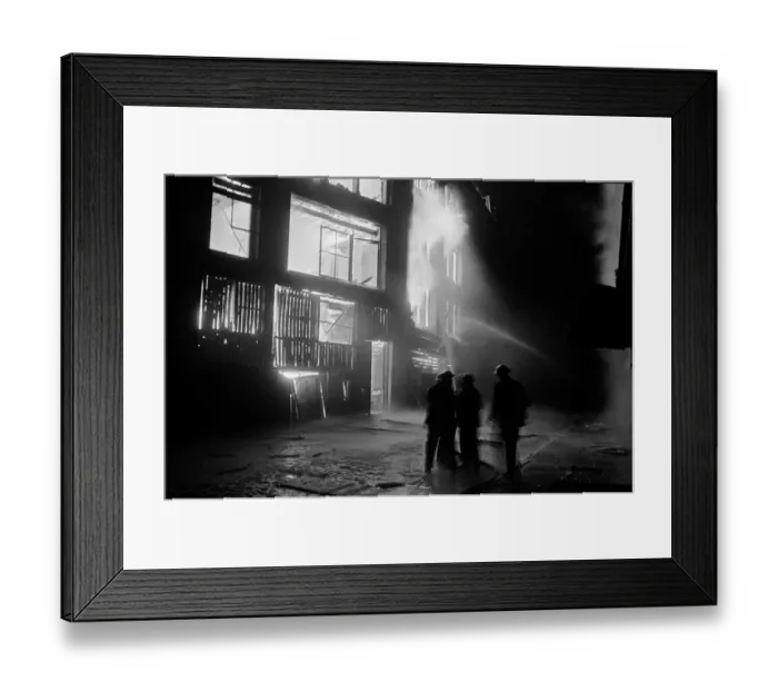Framed Print : Members of the Auxiliary Fire Service and London Fire Brigade seen here fighting a fire