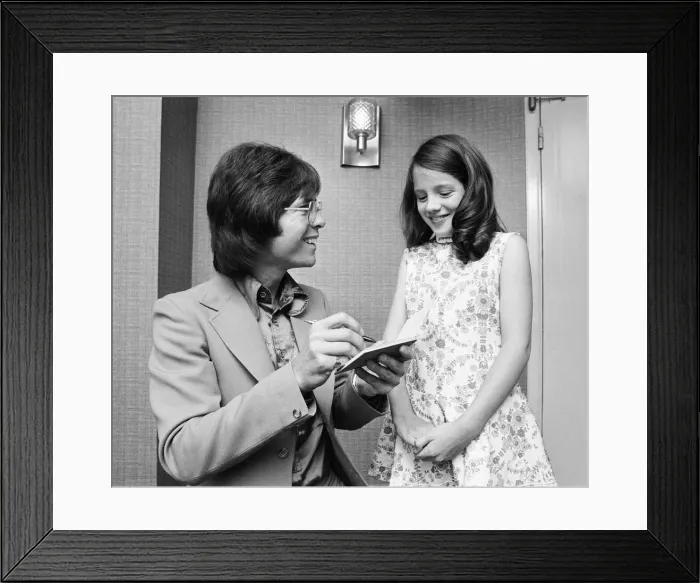 Framed Print : Cliff Richard signing autograph for a young fan, he is starring in Take Me High Framed Print : Cliff Richard signing autograph for a young fan, he is starring in Take Me High
