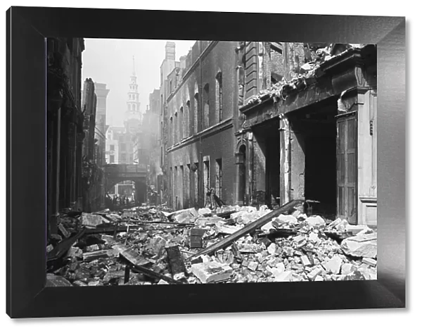 Rubble litters Poppins Court following the most devastating air raid on London which took