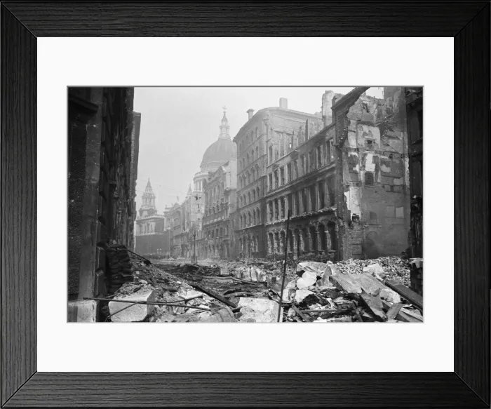 Framed Print : The dome of St Pauls Cathedral looms over the devastated remains of Cannon Street Framed Print : The dome of St Pauls Cathedral looms over the devastated remains of Cannon Street
