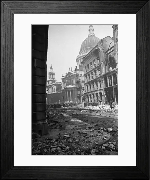 Framed Print : The dome of St Pauls Cathedral looms over the devastated remains of Cannon Street Framed Print : The dome of St Pauls Cathedral looms over the devastated remains of Cannon Street