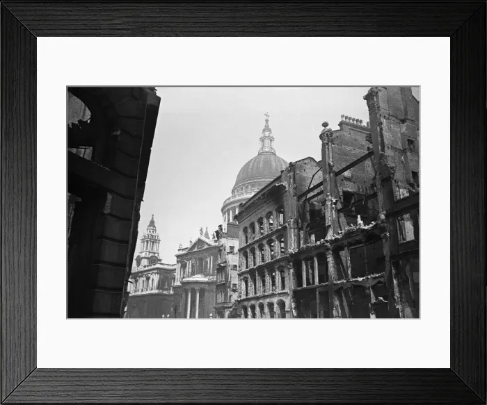 Framed Print : The dome of St Pauls Cathedral looms over the devastated remains of Cannon Street Framed Print : The dome of St Pauls Cathedral looms over the devastated remains of Cannon Street