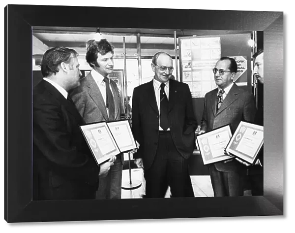 Mr Jack Jones (centre) after he had presented National Savings awards to the four