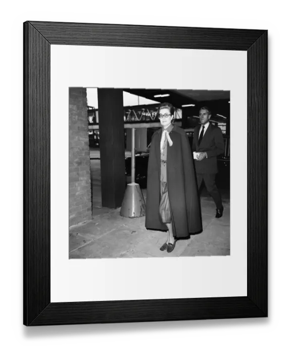 Framed Print : Princess Grace of Monaco, wearing a full length cape, as she arrives at Heathrow Airport Framed Print : Princess Grace of Monaco, wearing a full length cape, as she arrives at Heathrow Airport