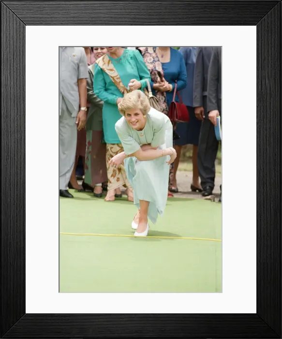 Framed Print : Diana, Princess of Wales visit to Indonesia 1989. The Princess plays a game of boules Framed Print : Diana, Princess of Wales visit to Indonesia 1989. The Princess plays a game of boules