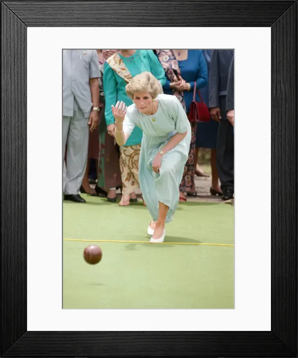 Framed Print : Diana, Princess of Wales visit to Indonesia 1989. The Princess plays a game of boules Framed Print : Diana, Princess of Wales visit to Indonesia 1989. The Princess plays a game of boules