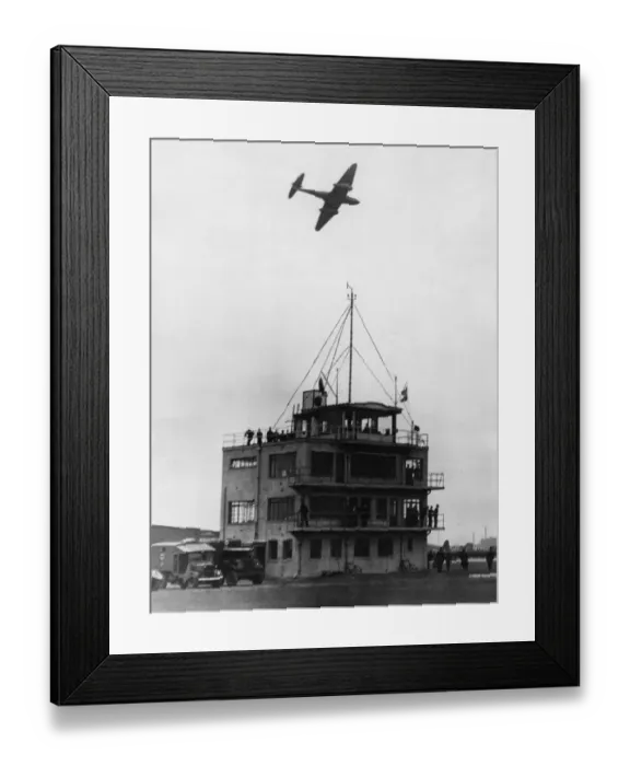 Framed Print : Gloster Meteor Aircraft passes over the Control Tower of Abbotsinch Airport, Paisley Framed Print : Gloster Meteor Aircraft passes over the Control Tower of Abbotsinch Airport, Paisley