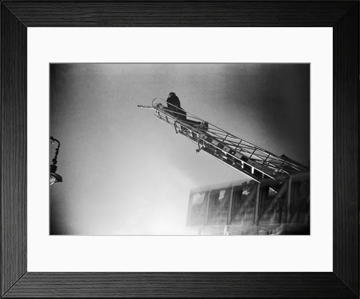 Framed Print : A turntable ladder of the London Fire Brigade tackles fires close to Waterloo railway Framed Print : A turntable ladder of the London Fire Brigade tackles fires close to Waterloo railway