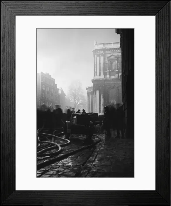 Framed Print : Firemen tackling fires in St Pauls Churchyard to stop the blaze reaching