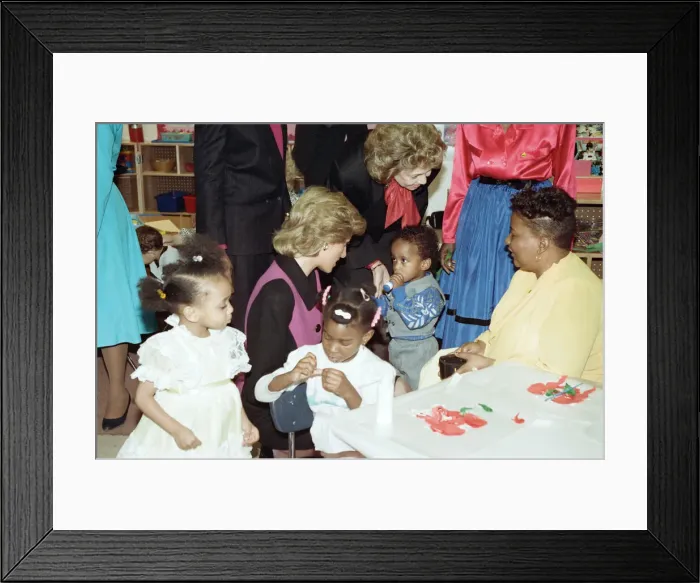 Framed Print : Diana, Princess of Wales visits a day nursery, New York City. February 1989 Framed Print : Diana, Princess of Wales visits a day nursery, New York City. February 1989