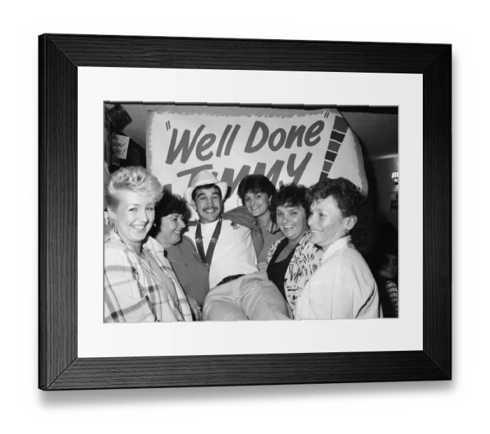 Framed Print : Boxer, Jimmy Moran celebrates his Commonwealth Games gold medal with friends at the Bell