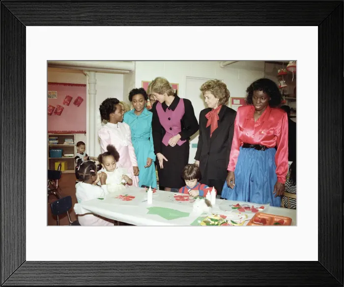 Framed Print : Diana, Princess of Wales visits a day nursery, New York City. February 1989 Framed Print : Diana, Princess of Wales visits a day nursery, New York City. February 1989