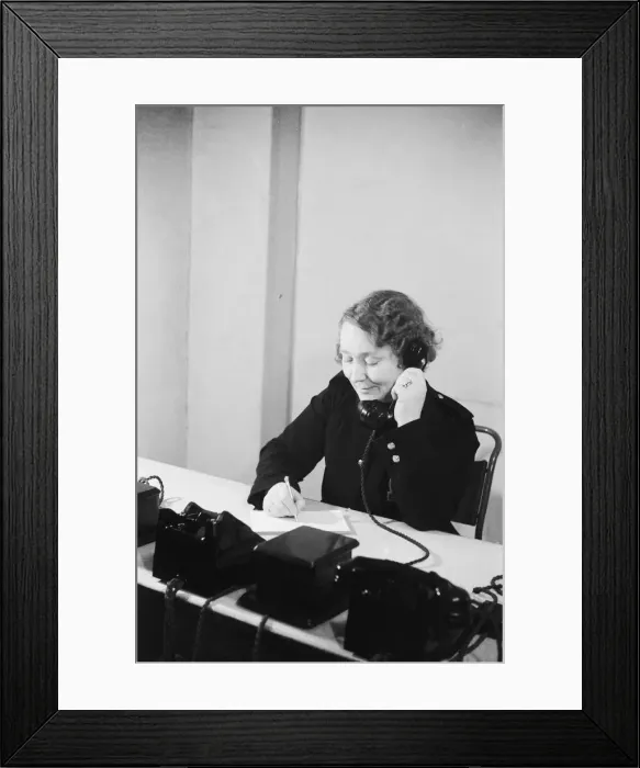 Framed Print : Auxiliary Fire Service (AFS) Leader Mrs E L Smith seen here after being commended for