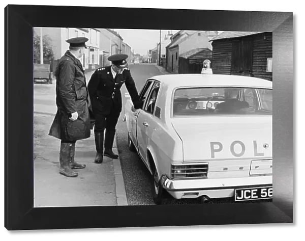 Cambridgeshire police officers beside a Ford Zephyr Police car, October 1968