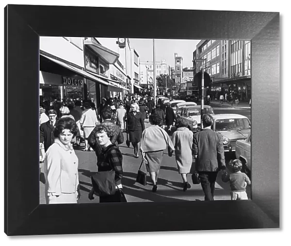 Shoppers in Swanseas main streets in search of bargains. 15th October 1965