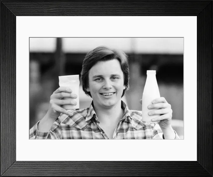 Framed Print : Keith Deller, the world champion darts player, with his pint of milk. 9th January 1983