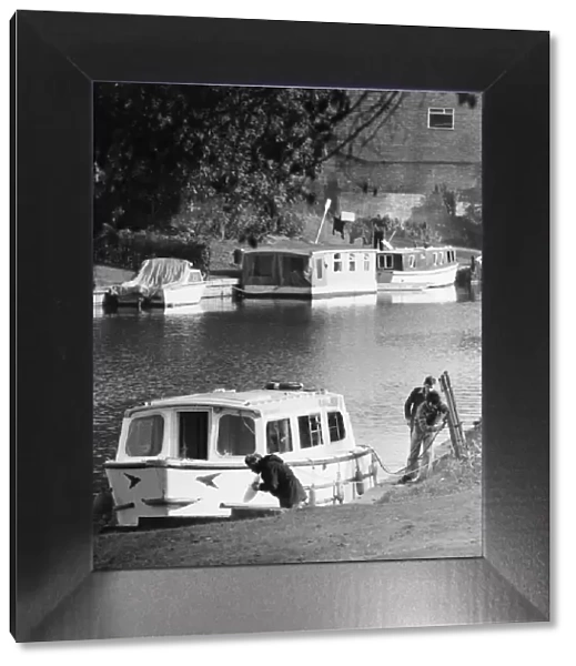 Scenes on the River Cam in Cambridge showing boats being moored. Circa 1975