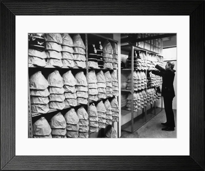 Framed Print : A wide selection of different sized helmets at the Mid Anglia police Headquarters, 1973 Framed Print : A wide selection of different sized helmets at the Mid Anglia police Headquarters, 1973