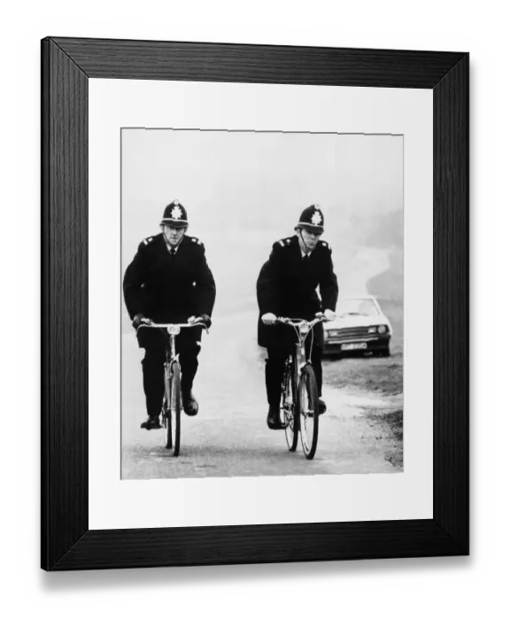 Framed Print : Two rural Police constables doing their rounds on bicycle at Newmarket, Cambridgeshire Framed Print : Two rural Police constables doing their rounds on bicycle at Newmarket, Cambridgeshire