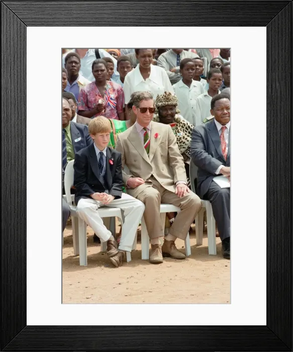 Framed Print : Prince Charles and his son Prince Harry visit the village of Dukuduku in South Africa