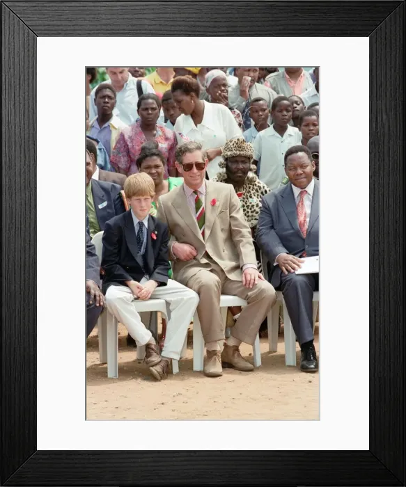 Framed Print : Prince Charles and his son Prince Harry visit the village of Dukuduku in South Africa Framed Print : Prince Charles and his son Prince Harry visit the village of Dukuduku in South Africa