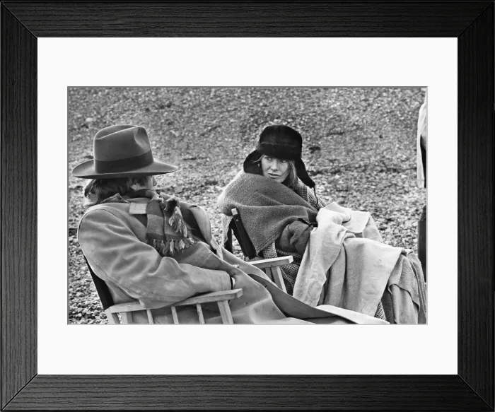 Framed Print : Vanessa Redgrave and James Fox sit in their cast chairs on the pebbled beach at Dover Framed Print : Vanessa Redgrave and James Fox sit in their cast chairs on the pebbled beach at Dover