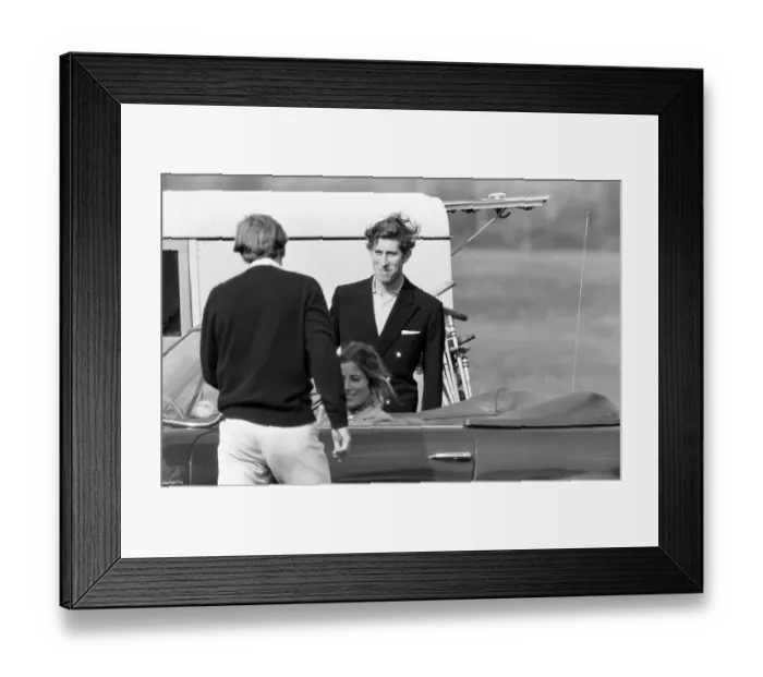 Framed Print : Prince Charles goes for a drive in his Aston Martin with a mystery girl companion Framed Print : Prince Charles goes for a drive in his Aston Martin with a mystery girl companion