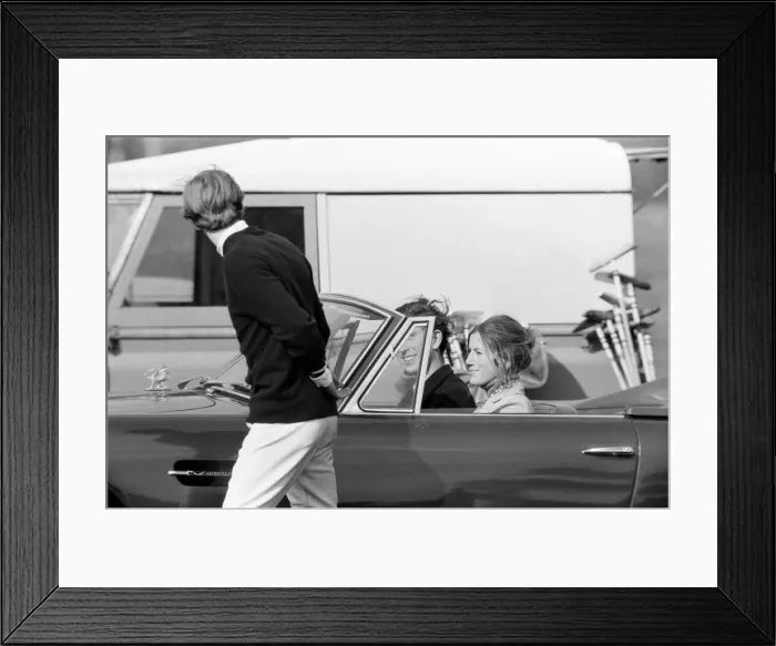 Framed Print : Prince Charles goes for a drive in his Aston Martin with a mystery girl companion Framed Print : Prince Charles goes for a drive in his Aston Martin with a mystery girl companion