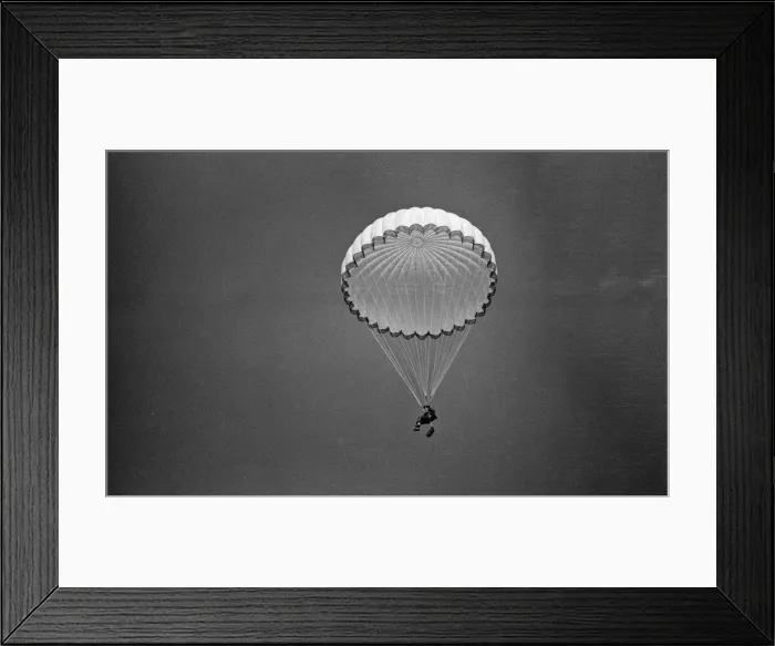 Framed Print : Prince Charles makes a parachute jump off the Dorset coast during his training as an RAF Framed Print : Prince Charles makes a parachute jump off the Dorset coast during his training as an RAF