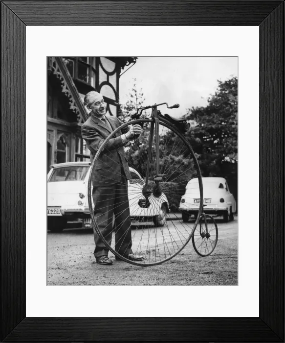 Framed Print : Mr Frederick Witts with his penny farthing bicycle at his home in Bryncoch, Neath, Wales Framed Print : Mr Frederick Witts with his penny farthing bicycle at his home in Bryncoch, Neath, Wales